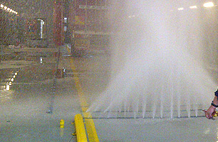 Under chassis wash nozzel spray