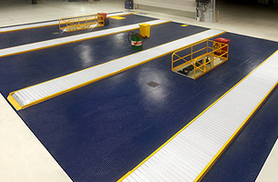 Prefabricated workshop pits that are manufactured off-site and then dropped into position